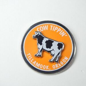 Cow Tippin’ Tillamook Oregon Spinning Medallion Cow Tipping